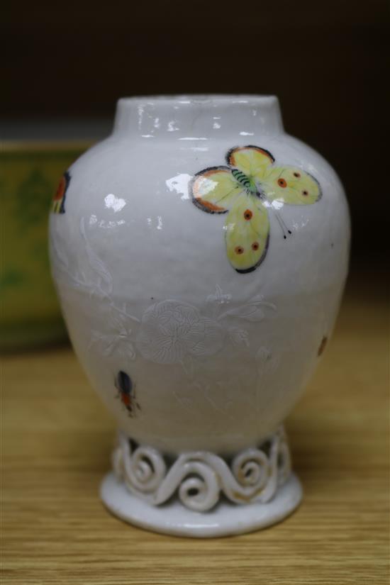 A Chinese yellow ground bowl, Qianlong mark and a Qianlong bianco sopra bianco insect tea caddy Height of vase 10cm